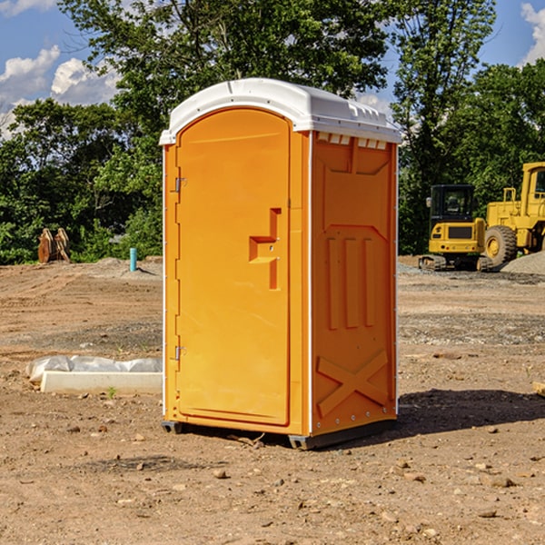 how often are the portable restrooms cleaned and serviced during a rental period in Roxbury KS